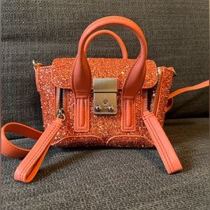 Brand new Phillip Lim Pashli Nano satchel bag in coral